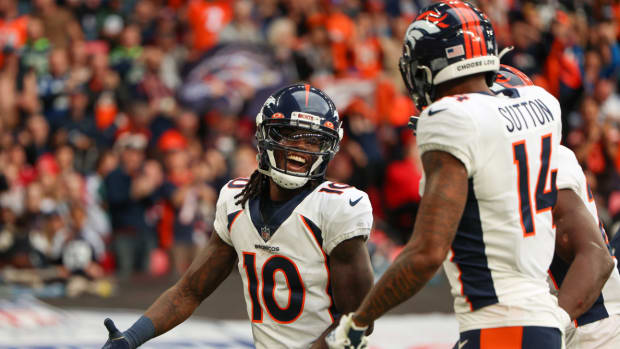 Broncos wide receiver Jerry Jeudy celebrates with Courtland Sutton.